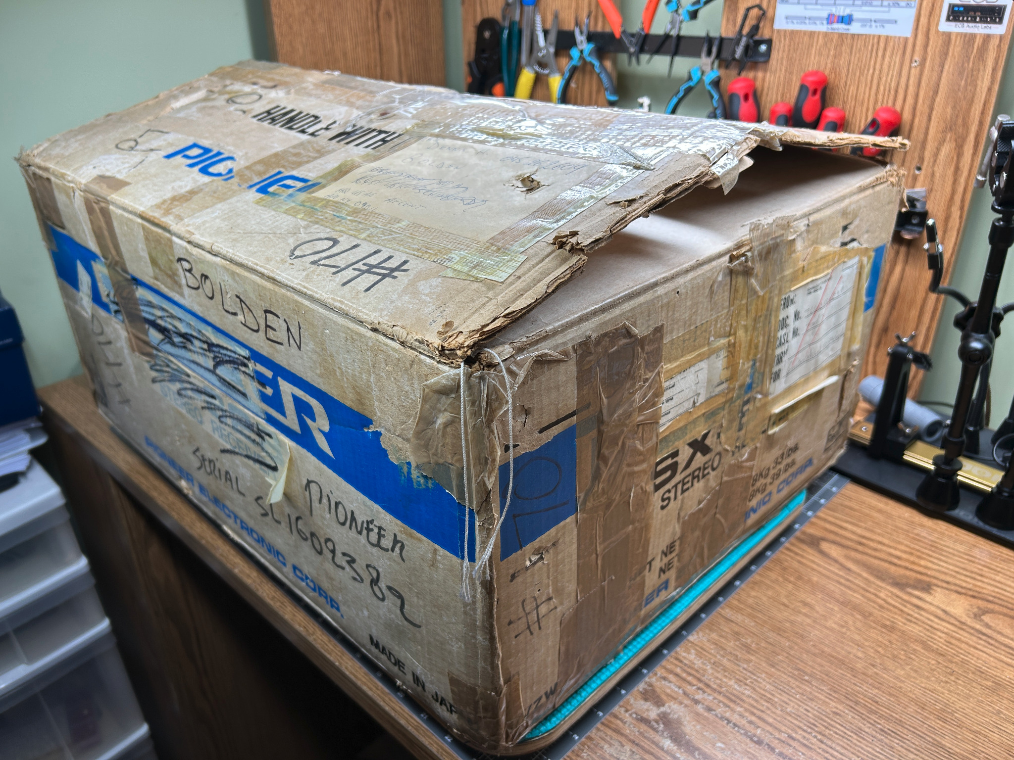 Original Pioneer SX-828 shipping carton with period military routing markings
